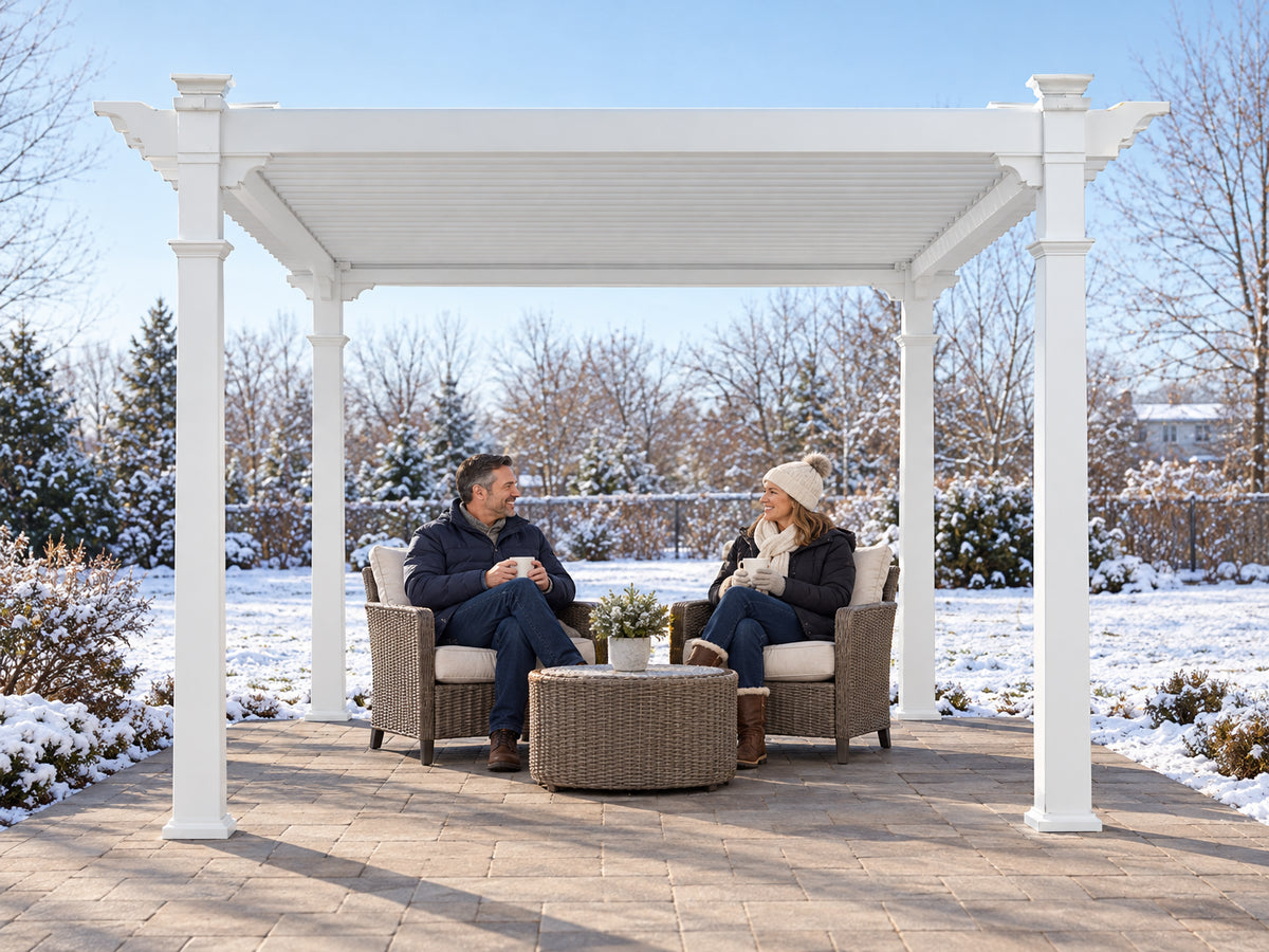 Vinyl Pergola Designed, a couple sitting under the pergola with louvers adjusted
